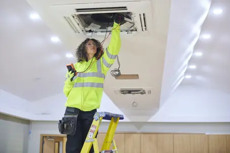 electrician working in an industrial facility